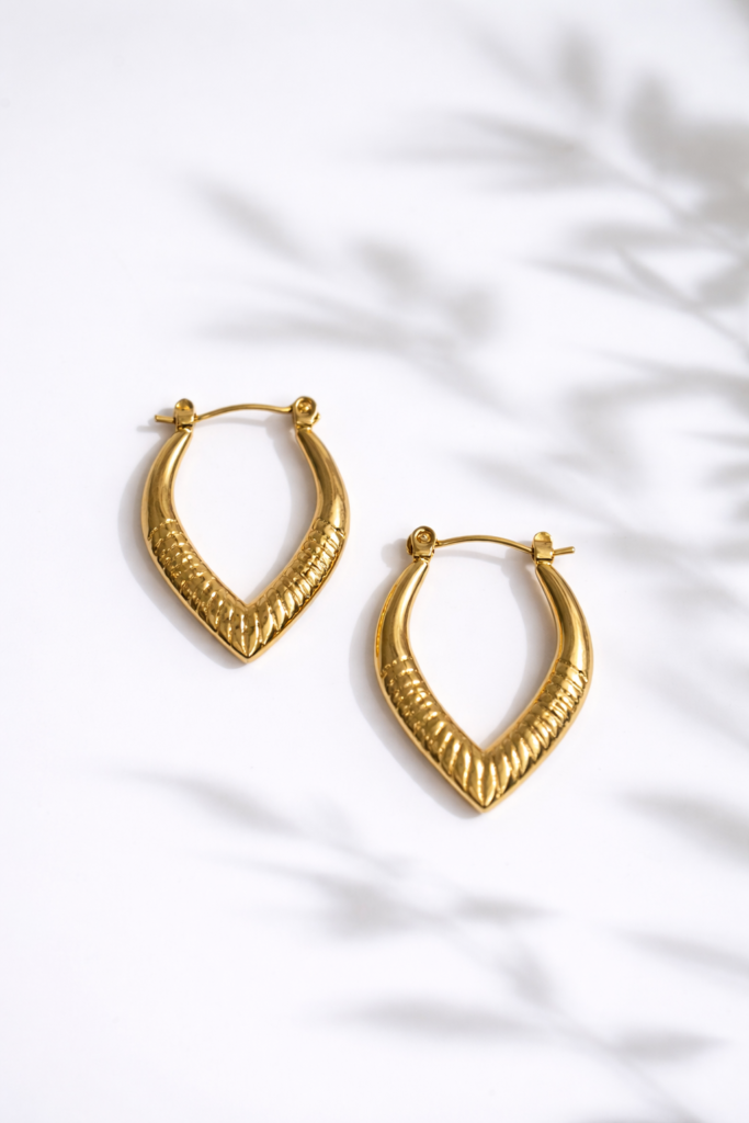 Golden vortex hoop earrings by Auryn Jewells