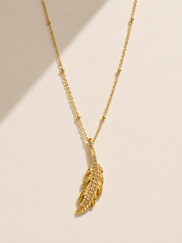 golden feather spark necklace by auryn jewells