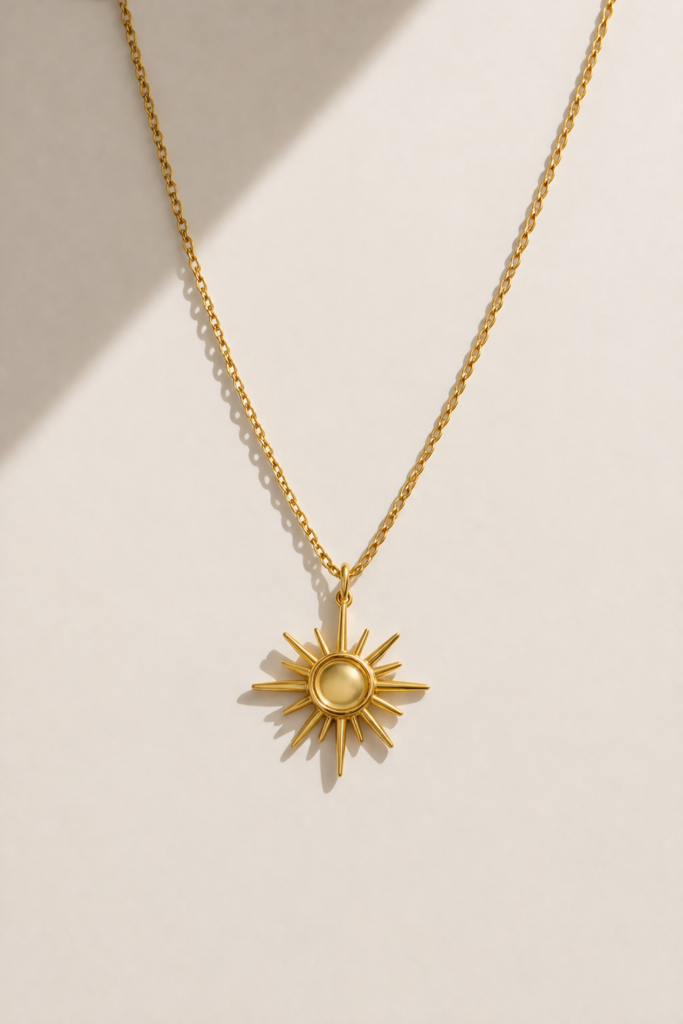 golden sunburst pendent by Auryn Jewells