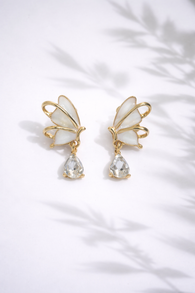 ivory flutter drop earrings by Auryn Jewells