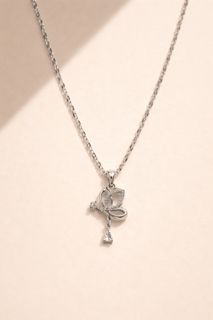 silver butterfly necklace by Auryn Jewells