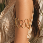 model wearing wave arm cuff by auryn jewells