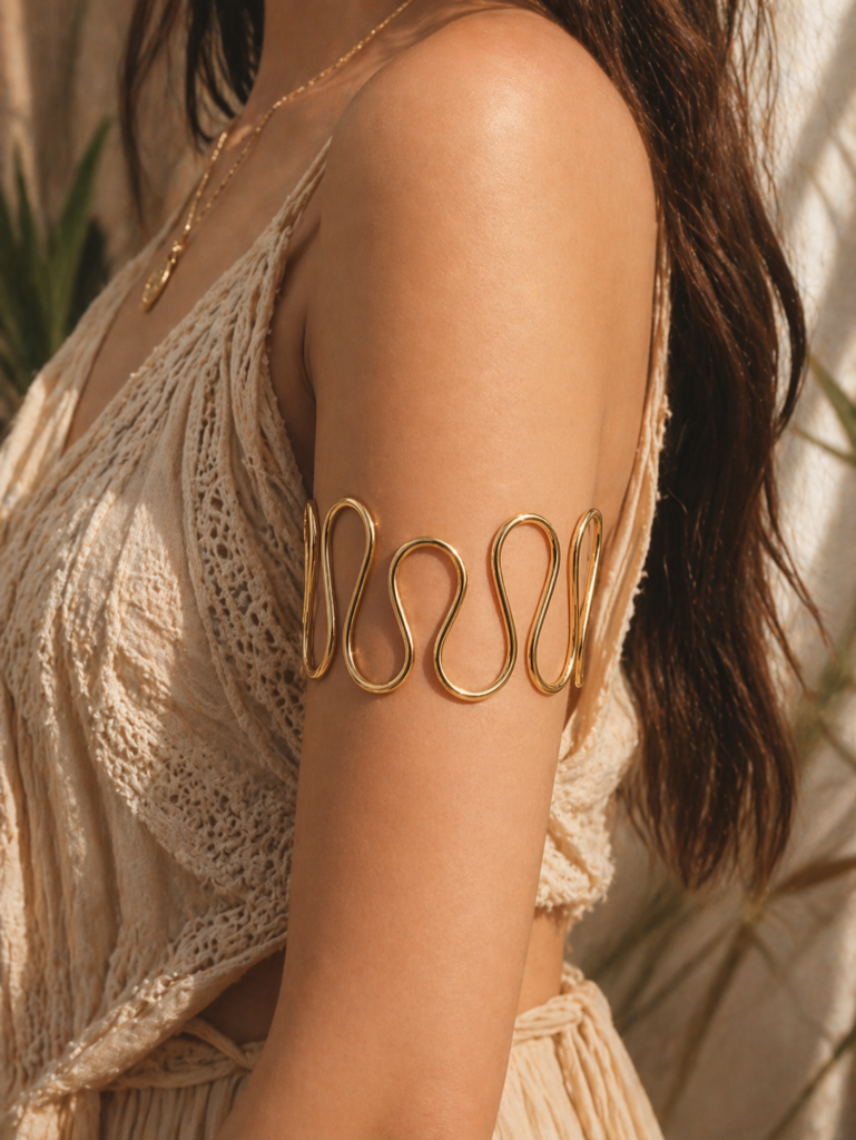 model wearing wave arm cuff by auryn jewells
