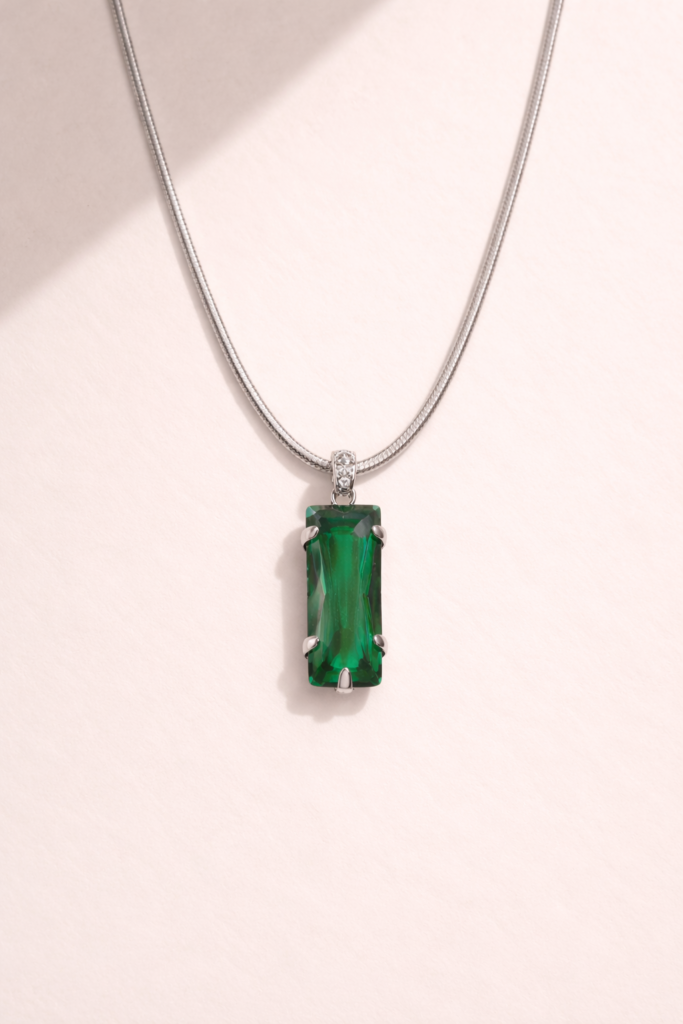 silver necklace with emerald heart by Auryn Jewells