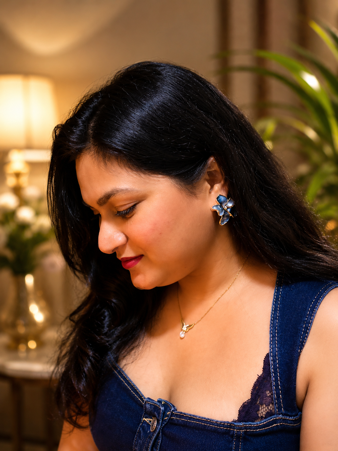 model wearing midnight petal earrings by auryn jewells